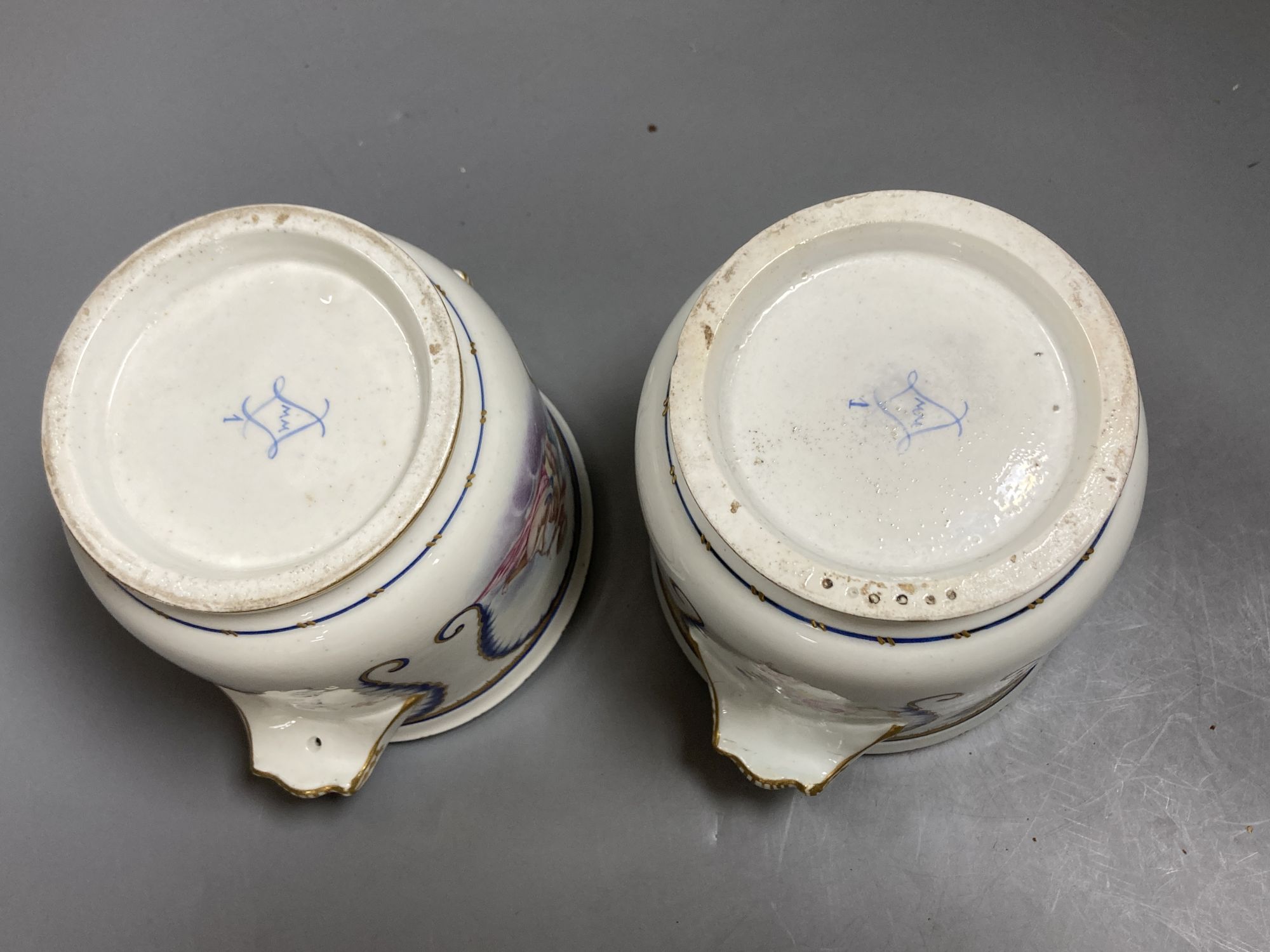 A pair of 19th century Sevres style porcelain half bottle wine coolers, 12cm high